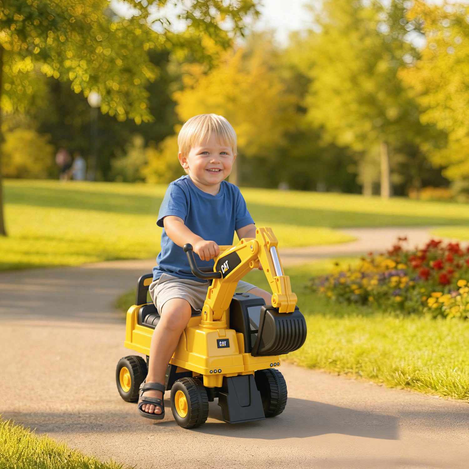 CAT Licensed Ride-On Digger for Toddlers With Manual Shovel Arm